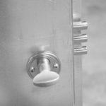 Door mechanism detail on bunded flat pack store