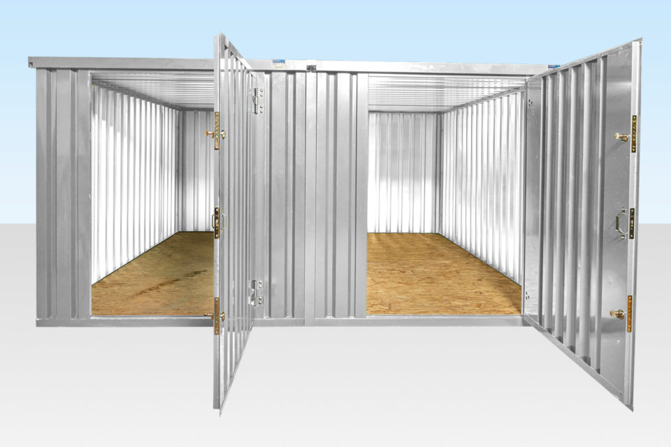 Two flat pack containers connected side by side - doors open
