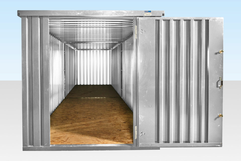Interior view of 2 x flatpack containers linked end on end - door open