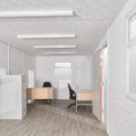 Desks in a large portable office cabin